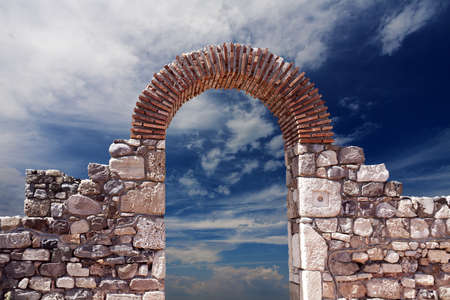 Stone arch against the skyの写真素材