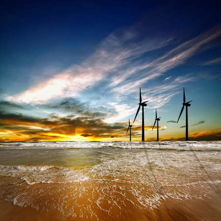 Wind farm at sunriseの写真素材