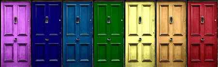 A few colorful doors in vintage style as a banner. Pink, navy blue, blue, green, yellow, orange, red...