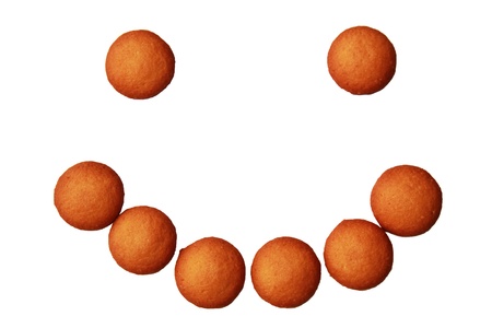 isolated smile face made from cookiesの写真素材