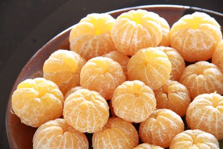 mini orange on a plateの写真素材