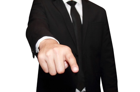 isolated young business man pointingの写真素材