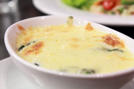 delicious baked spinach with cheeseの写真素材
