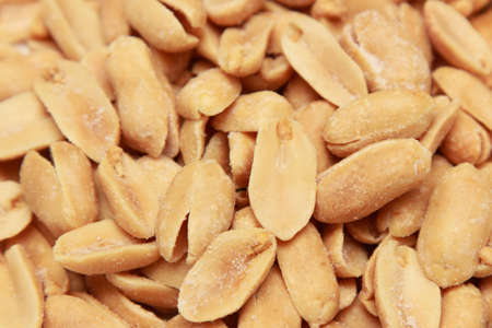 background of roasted peanuts with salt