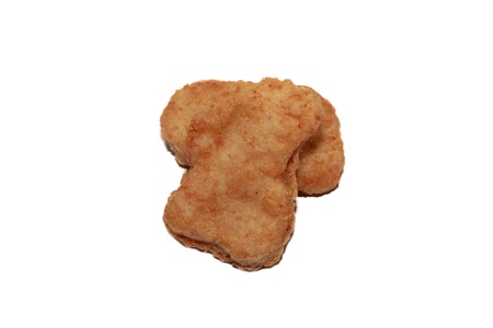 isolated chicken nuggets in whiteの写真素材