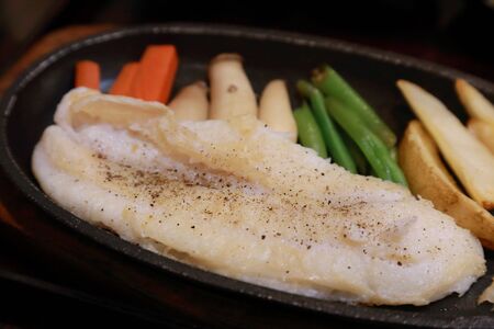 dory fish steak in hot plate