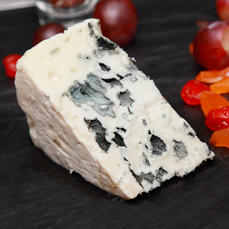 blue cheese on the tableの写真素材