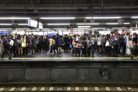 TOKYO -OCT 21   rush hour at the  Shinjuku train station on 21 October 2013  Shinjuku is one of  the important  district with one of the biggest train station  in Japan のeditorial素材