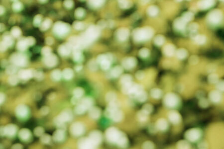 abstract yellow bokeh background from flowersの写真素材