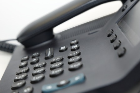 isolated office phone in white backgroundの写真素材