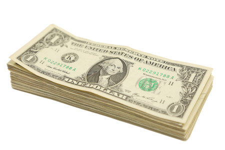 isolated heap of a dollar banknotes in white background
