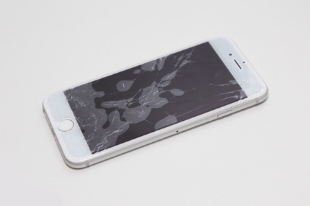 BANGKOK, THAILAND -NOVEMBER 16, 2014: the new apple iphone6 with broken sceen on 16  November 2014 in Bangkok Thailand.のeditorial素材