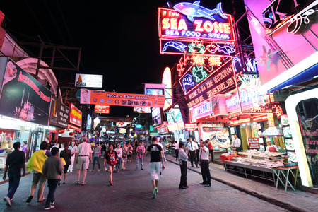 PATTAYA, THAILAND - DECEMBER 13: Unidentified tourist walk through the Walking Street  in Pattaya on December 13, 2014 . Walking Street is a popular tourist attraction in pattayaのeditorial素材