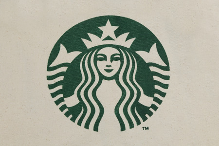 BANGKOK, THAILAND -FEBRUARY 20, 2015: The Starbucks Coffee logo on canvas on February 20,2015 in Bangkok Thailandのeditorial素材