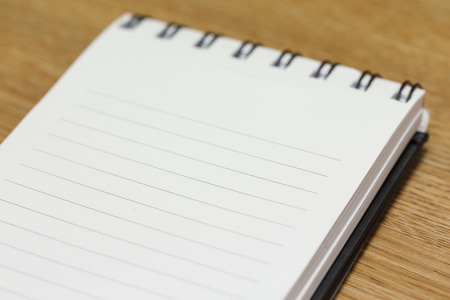 note paper with blank space on a wooden table