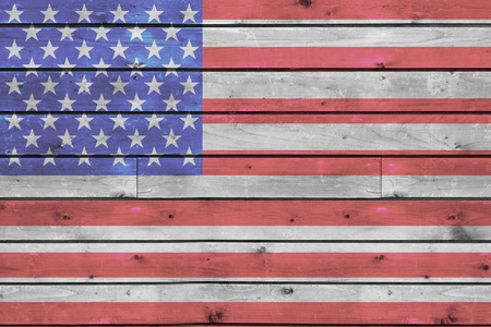 usa flag on old wood texture backgroundの写真素材
