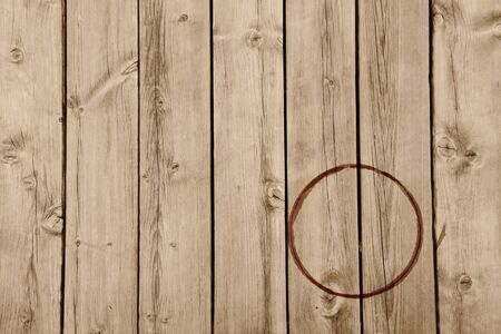 coffee cup stained on wooden plankの写真素材