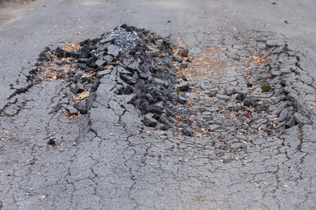 background of the damaged of the streetの写真素材