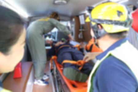 emergency response team help the victim with the first aidの写真素材