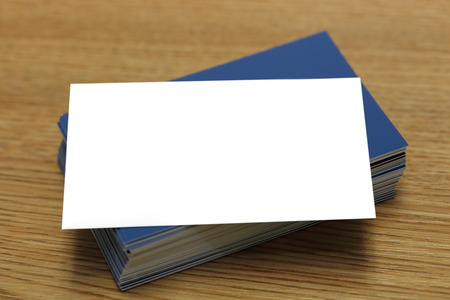 blank business card on the wooden tableの写真素材