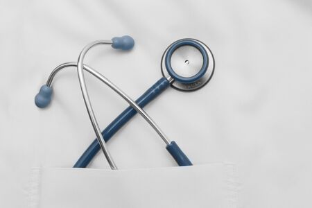 stethoscope in the doctor's uniform pocketの写真素材