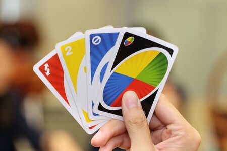 BANGKOK, THAILAND - JULY 5, 2016: Uno card game on a hand on July 5,2016 in Bangkok Thailand.