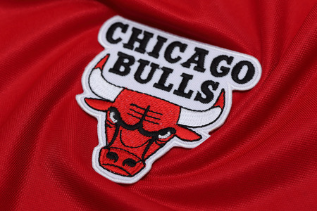 BANGKOK, THAILAND -AUGUST 18, 2016: The Logo of Basketball TeamChicago Bulls on the textile on...