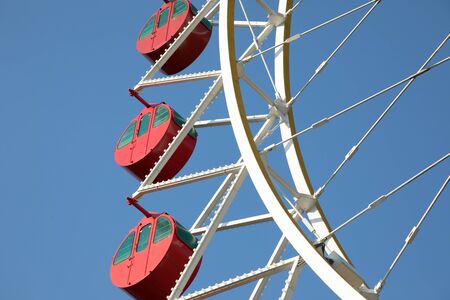 Ferris wheel against the blue skyの写真素材