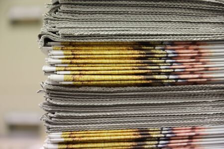 background of a pile of newspapers with spaceの写真素材