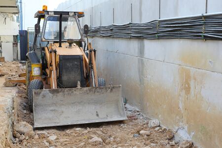 Yellow bulldozer  in the construction site