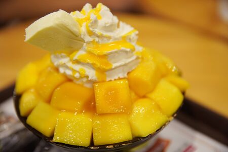 close-up on famous korean dessert mango bingsuの写真素材