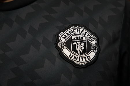 BANGKOK, THAILAND - AUGUST 5: The Logo of  Manchester United Football Club on the Jersey on August 5,2017 in Bangkok Thailand.のeditorial素材