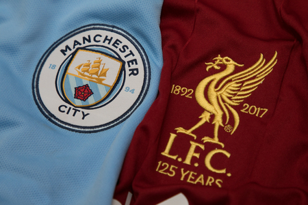 BANGKOK, THAILAND - SEPTEMBER 19: The Logo of Manchester City and Liverpool on Football Jerseys on September 19,2017 in Bangkok Thailand.のeditorial素材