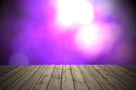 Wood plank with purple bokeh backgroundの写真素材