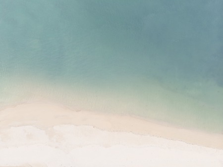 Aerial View of Sandy Beach and Blue Seaの写真素材