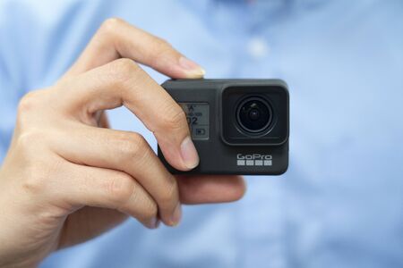 BANGKOK, THAILAND - SEPTEMBER 28 : Image of Hand Hold New GoPro HERO 7 Black with New  Hypersmooth...