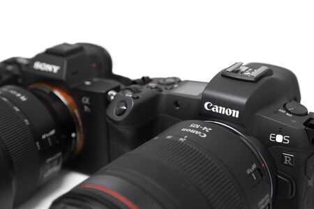 BANGKOK, THAILAND - October 24, 2018 : The New  Launched  Canon Mirrorless EOS-R Compared to Sony A7III Mirrorlessのeditorial素材
