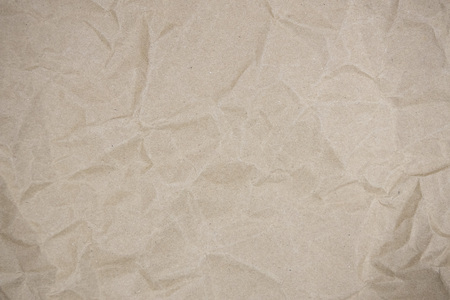 background of crumpled brown paperの写真素材