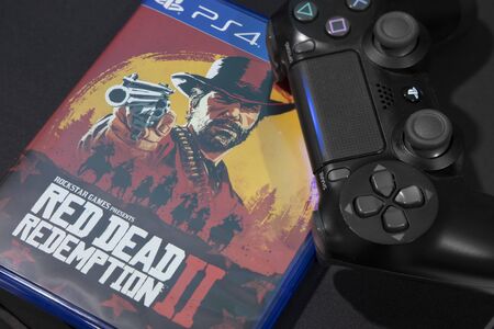 BANGKOK, THAILAND-NOVEMBER 26:  The New Red Dead Redemption 2 game with  ps4 Joystick on ps4 Console...