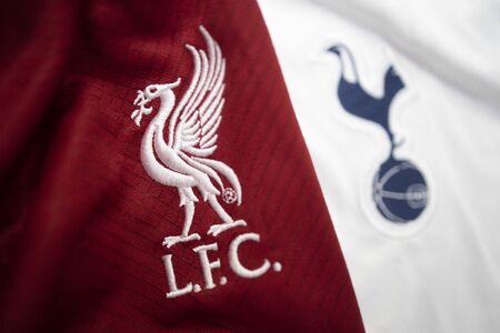 BANGKOK, THAILAND - MAY 11, 2019 : Selective Focus on The Logo of Liverpool  and Blurred Tottenham...