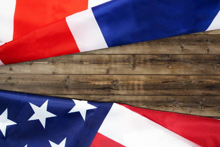 rippled us flag on wooden backgroundの写真素材