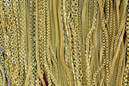 background of gold necklace in a store shelf