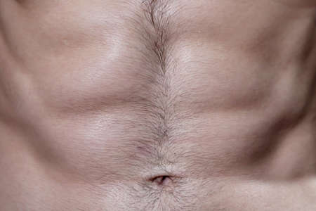 Close Up on Hairy Six Pack MaleTorsoの写真素材