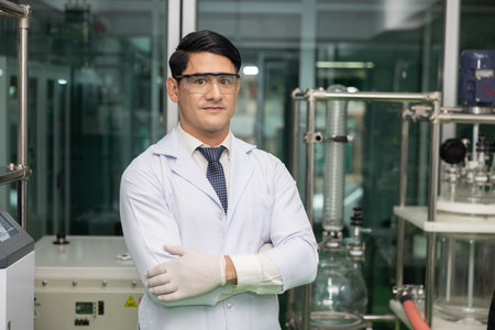 Caucasian Scientist with Crossed Arms Pose in a Labの写真素材