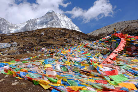 Magic flags among the way to The Milk Lake at Yading Nature Reserve Chinaの写真素材