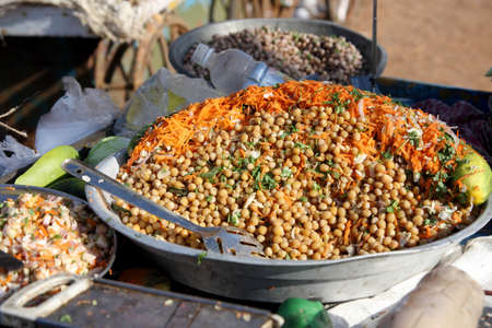 Traditional indian food, Peanuts mixed with soybean, coriander, carrots, onions and   cucumbers, Indian street foodの写真素材