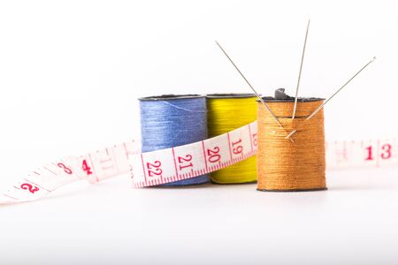 sewing threads and tape measureの写真素材
