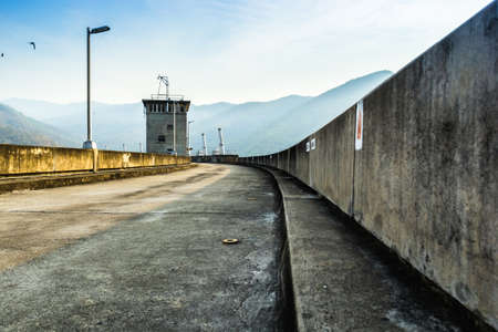 Dam in Thailand The structure of the dam built of concrete to be used to support the water. The dam on the roads, which are made of chrome. After the engineering design of the building.の写真素材