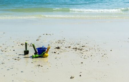 Devices of children playing on the beach with the equipment used to scoop sand.の写真素材