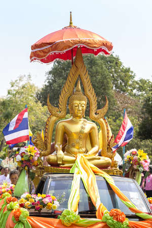 The convoy paraded Buddha flag of Thailand on the eve of important. Phra That Na Dun  February 20, 2016 Mahasarakham, Thailand.のeditorial素材